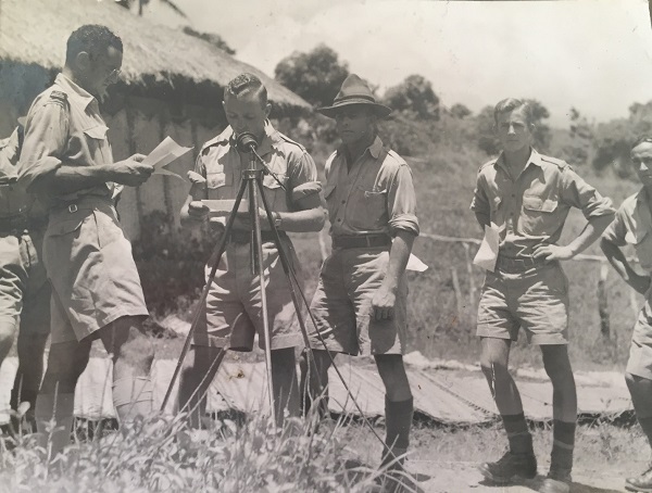 Image: Broadcaster E.V. Spencer (left) recording radio messages from New Zealand troops in the Pacific, 1943. (Image courtesy of the Spencer family.)